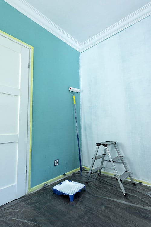 painting-tools-on-wall-background